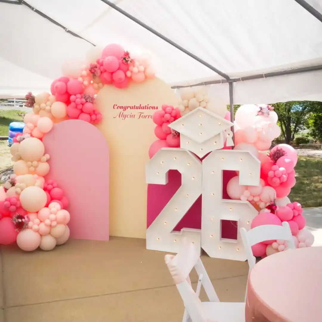 17 Pretty Pink Graduation Party Ideas You’ll Love 5 Pink Balloon Arch Entrance